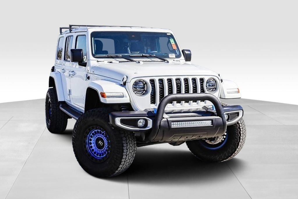 Used 2022 Jeep Wrangler Unlimited Sahara 4XE with VIN 1C4JJXP60NW103122 for sale in Claremont, CA