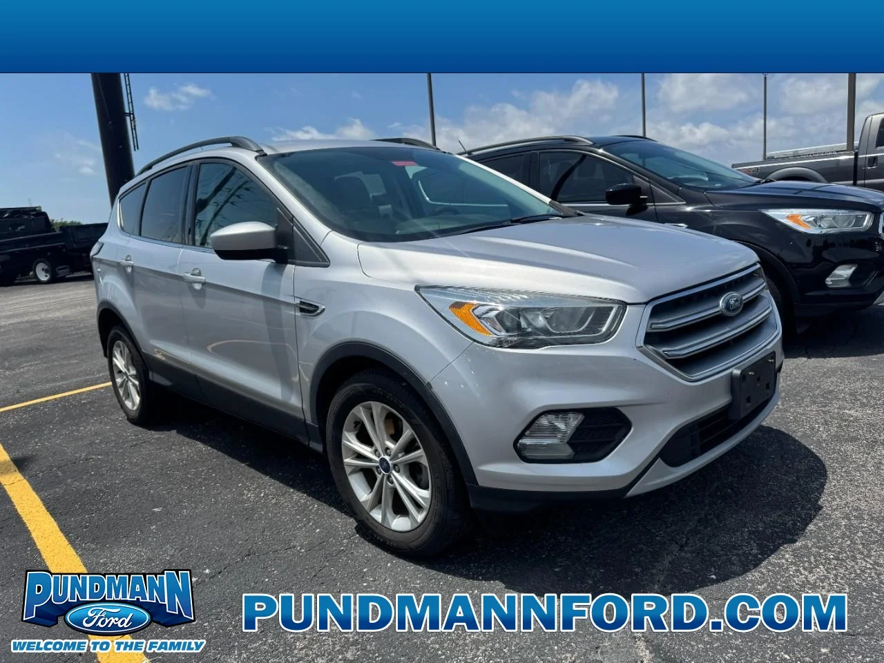 Used 2017 Ingot Silver Metallic Ford SE FWD image 1