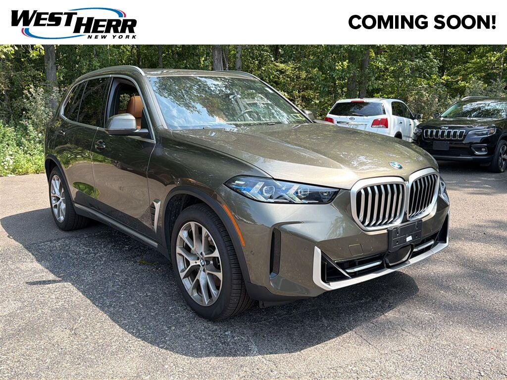 Used 2024 Manhattan Green Metallic BMW xDrive40i image 1