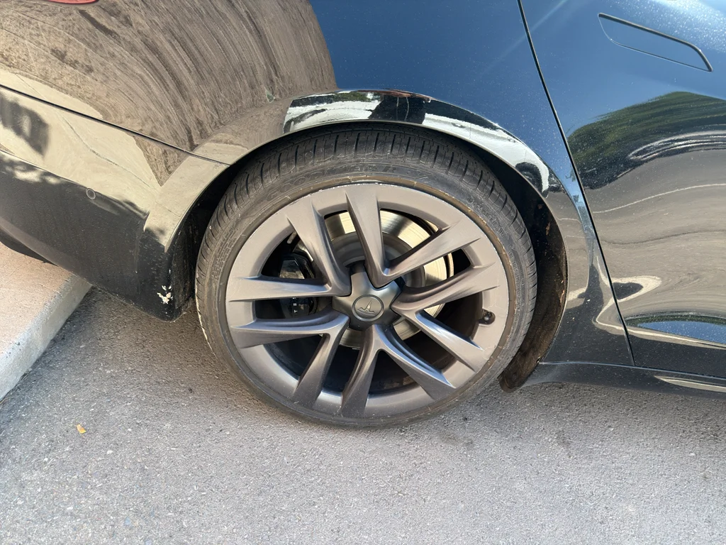 Used 2022 Solid Black Tesla Plaid image 4