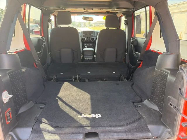 Used 2015 Orange Jeep Unlimited Sport image 30