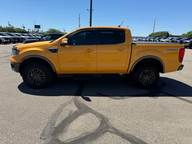 Used 2022 Orange Ford Lariat Tremor image 7