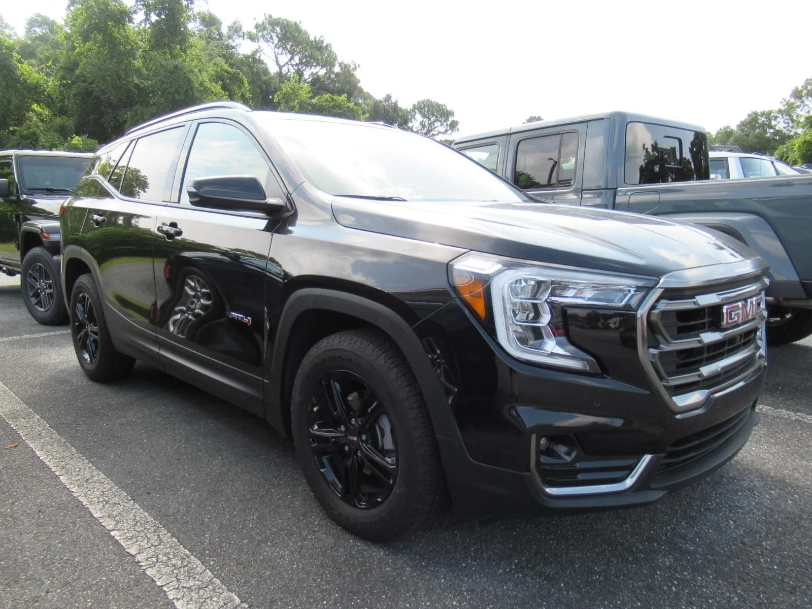 Used 2022 Black GMC AT4 image 1