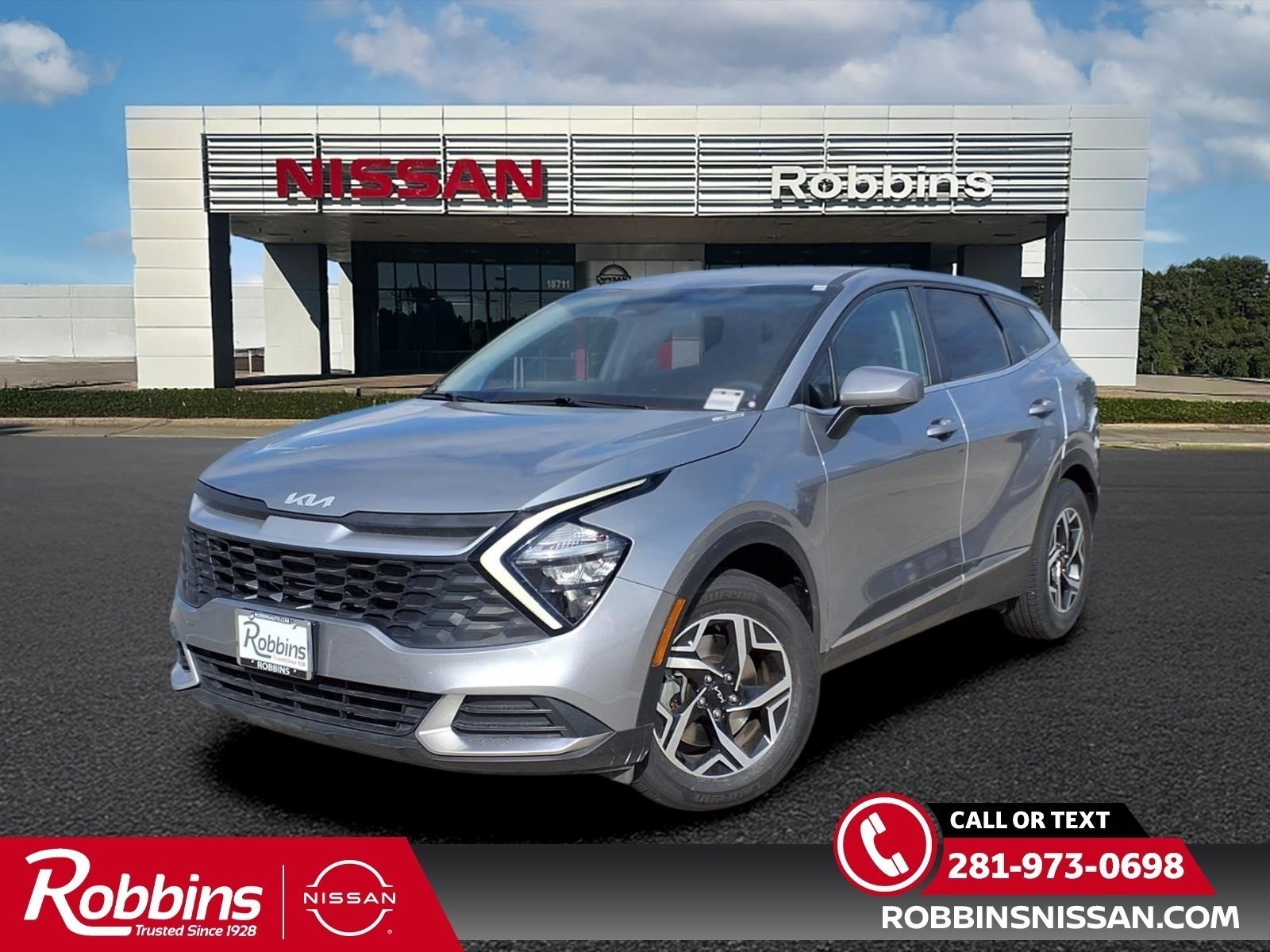 Used 2023 Steel Gray Kia LX image 1