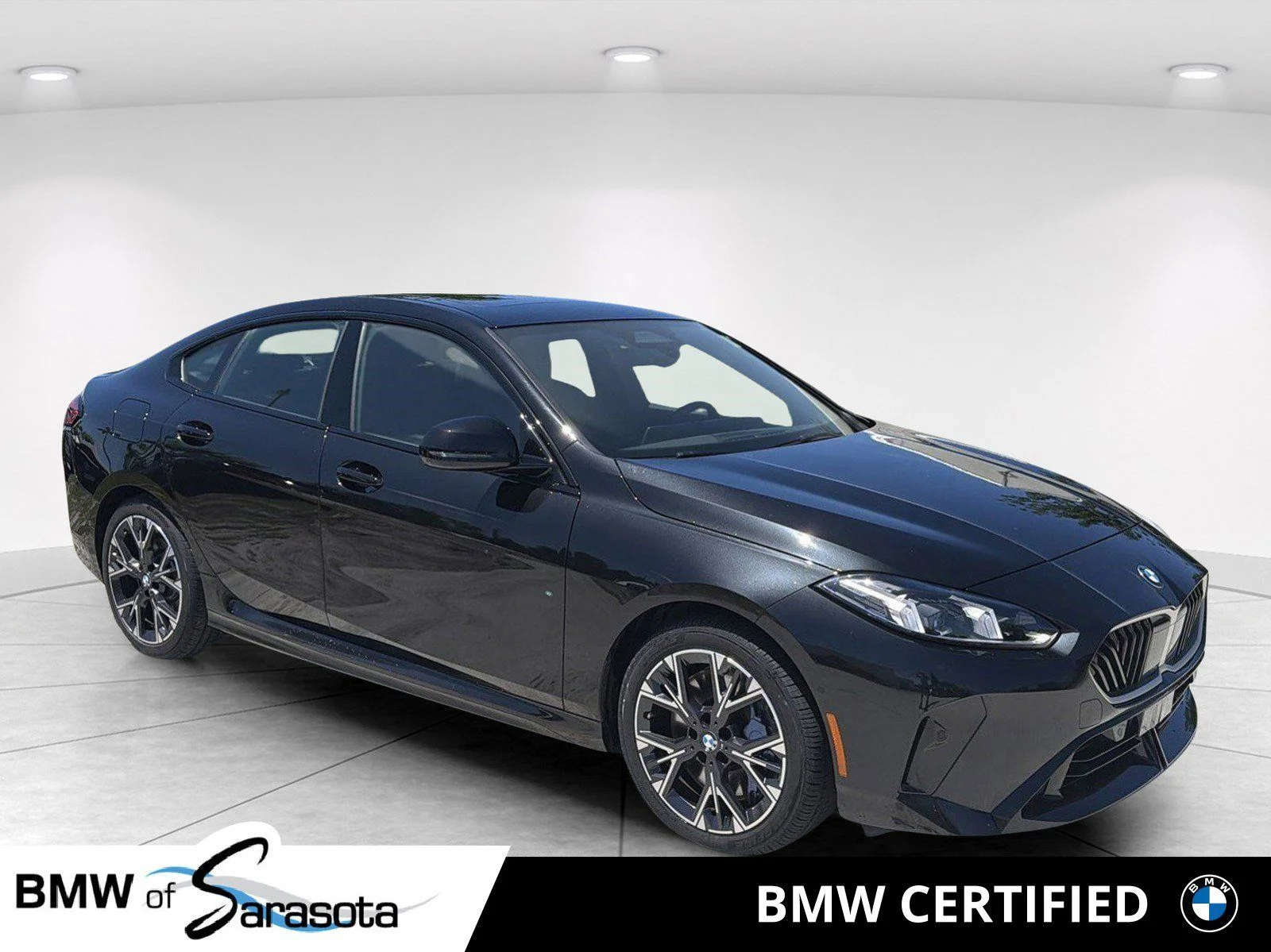 Certified Used 2025 Black Sapphire Metallic BMW 228 xDrive Gran Coupe image 1