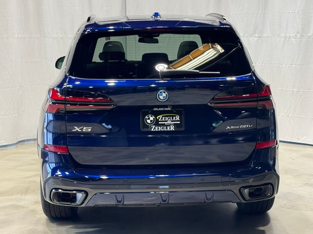 Used 2026 Blue BMW xDrive50e image 5