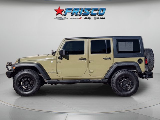 Used 2013 Green Jeep Unlimited Sport image 4