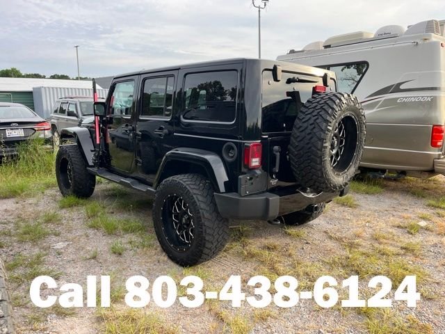 Used 2017 Black Jeep Unlimited Sahara image 3