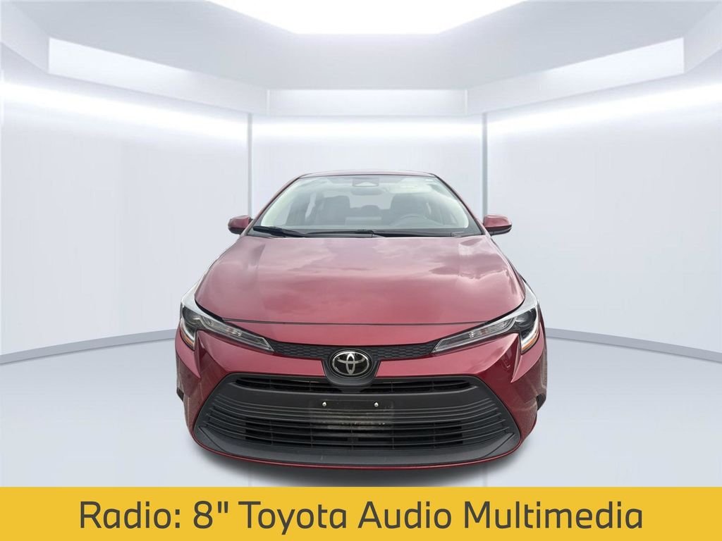 Used 2025 Red Toyota LE image 2