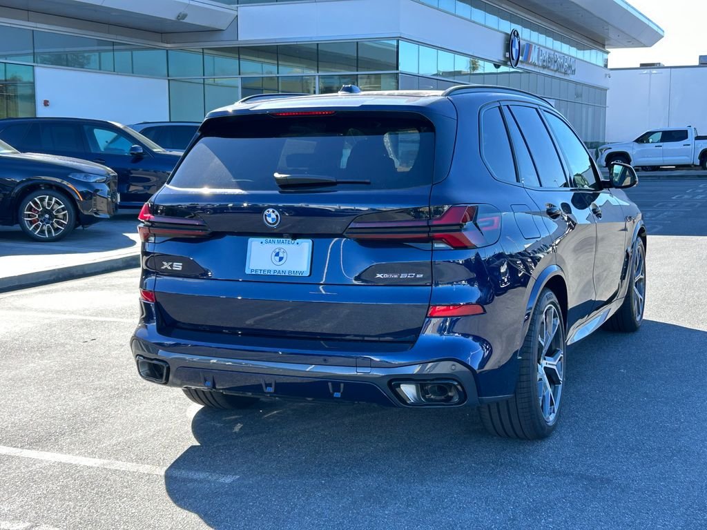 New 2026 Tanzanite Blue II Metallic BMW xDrive50e image 5