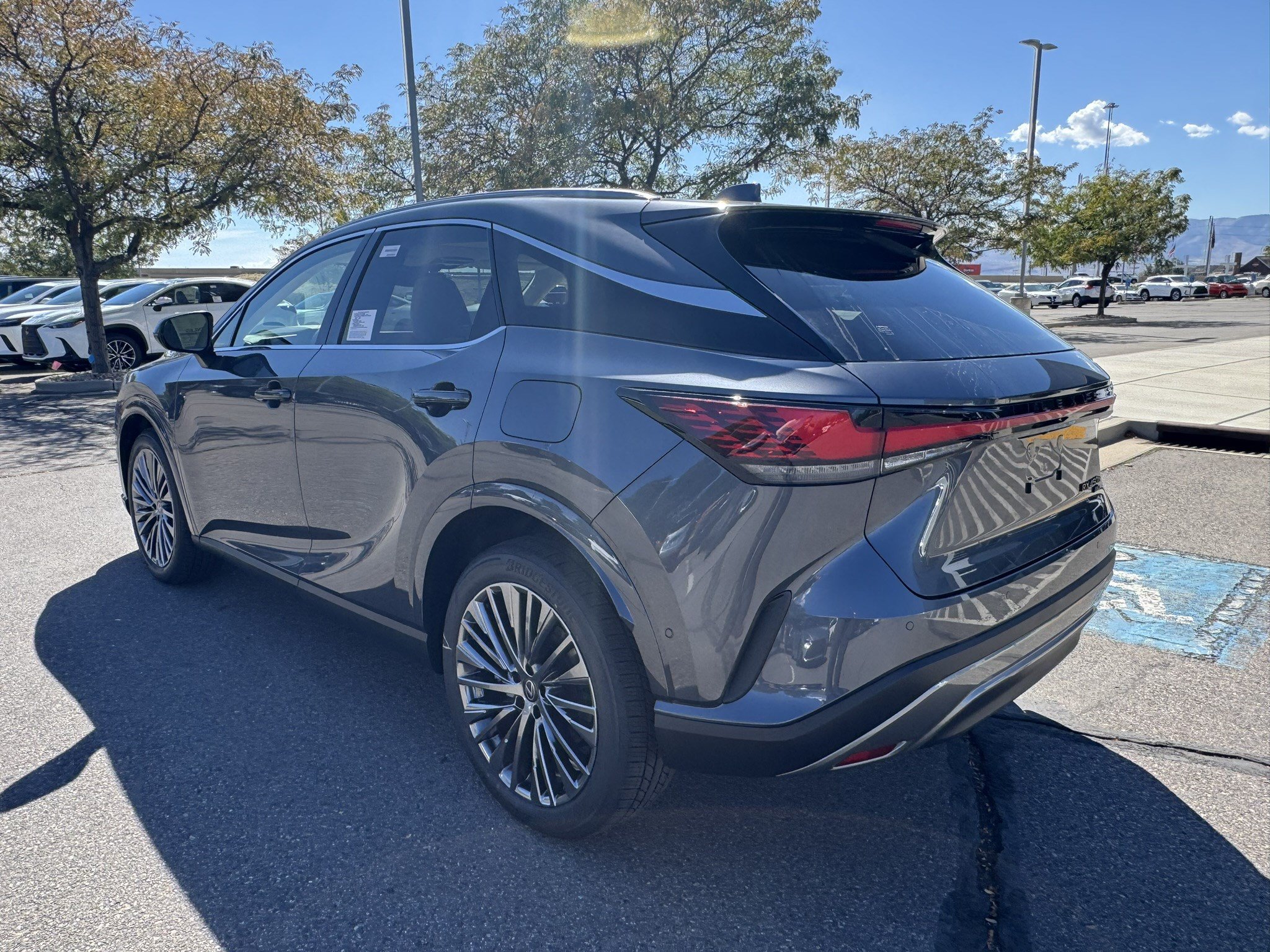 New 2026 Cloudburst Gray Lexus LUXURY AWD image 4