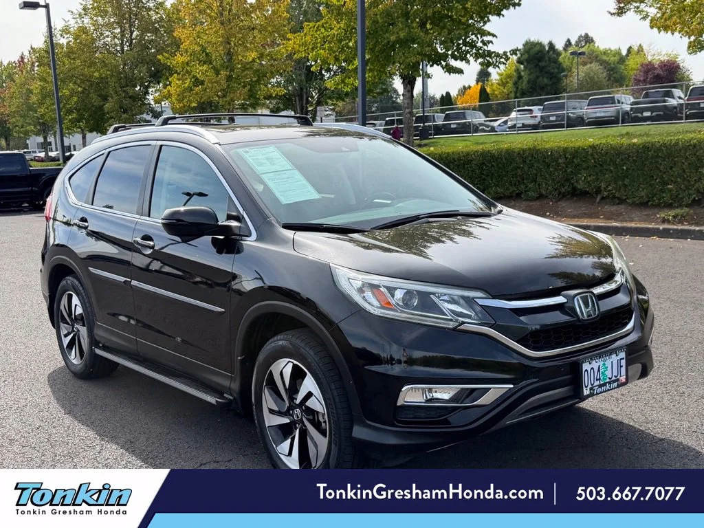Used 2016 Crystal Black Pearl Honda Touring image 1