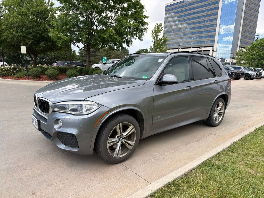 Used 2014 Gray BMW xDrive35i image 1