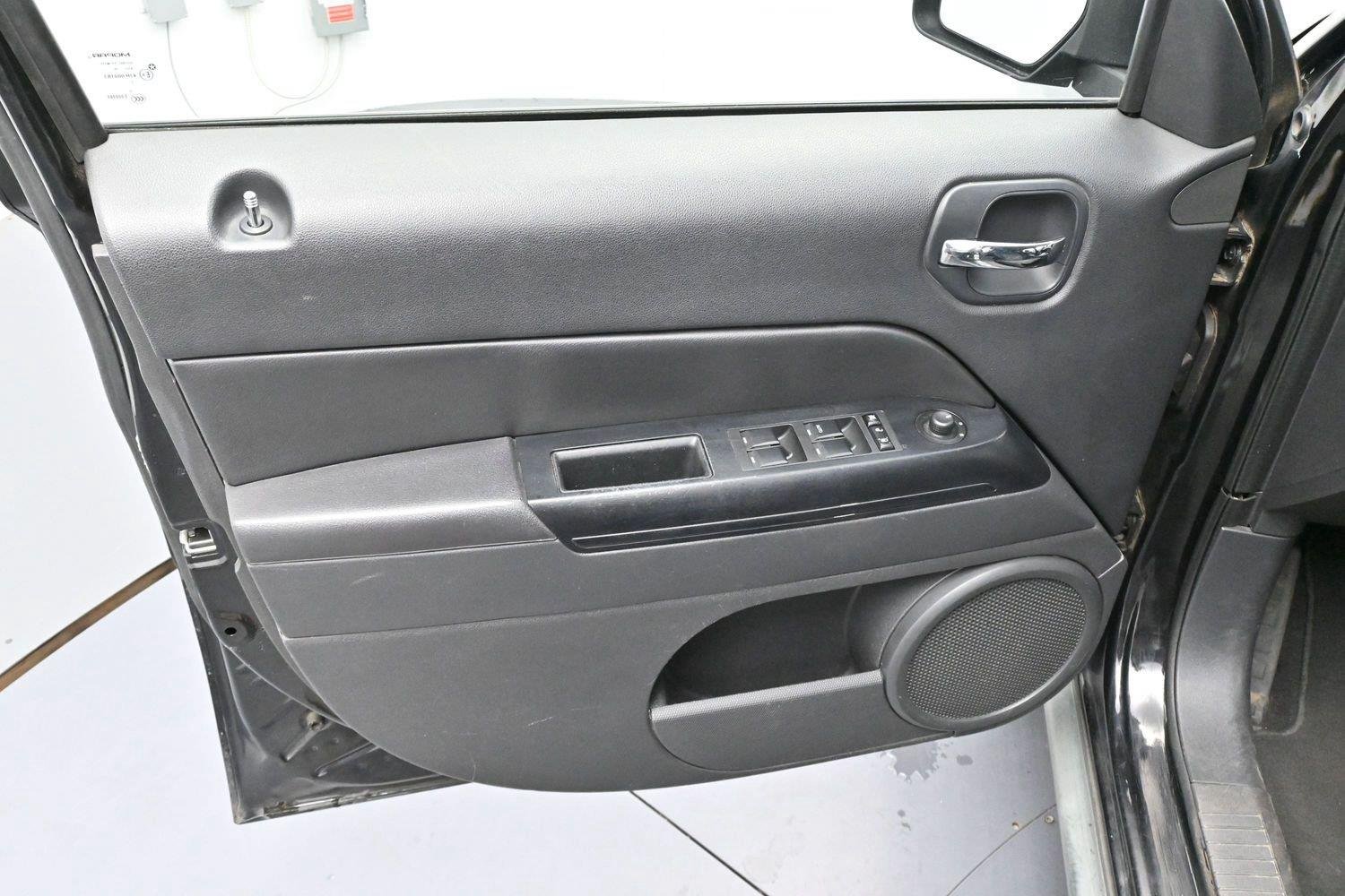 Used 2011 Brilliant Black Crystal Pearl Jeep Sport image 9
