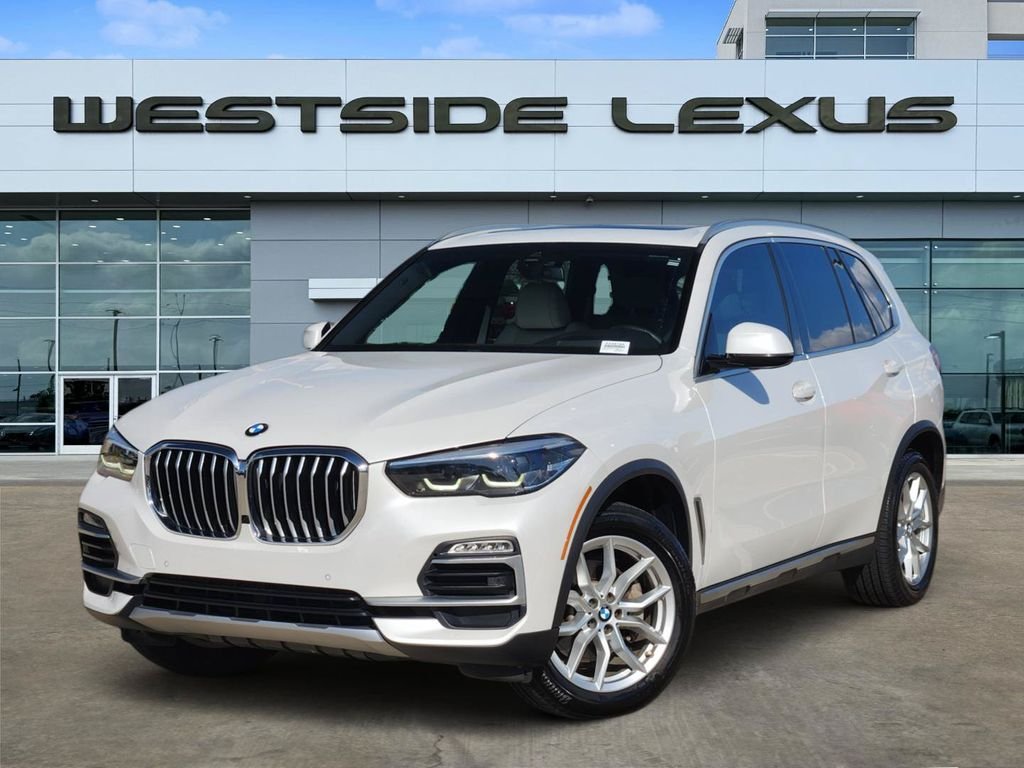 Used 2019 White Metallic BMW xDrive40i image 1