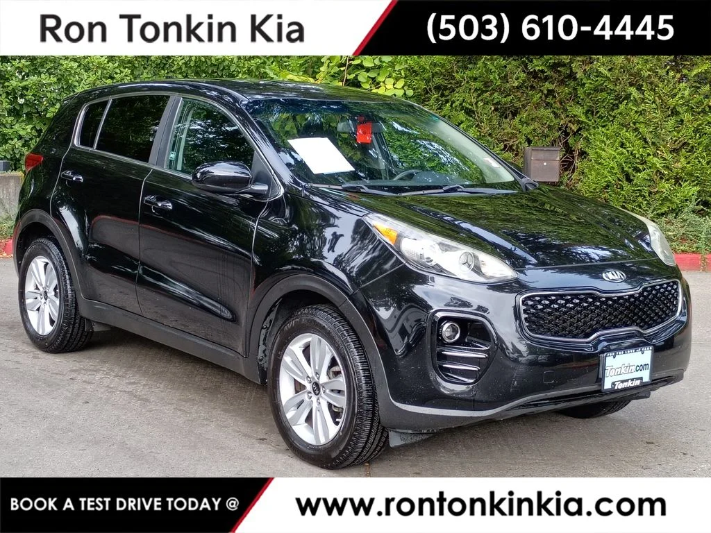 Used 2018 Black Cherry Kia LX image 1