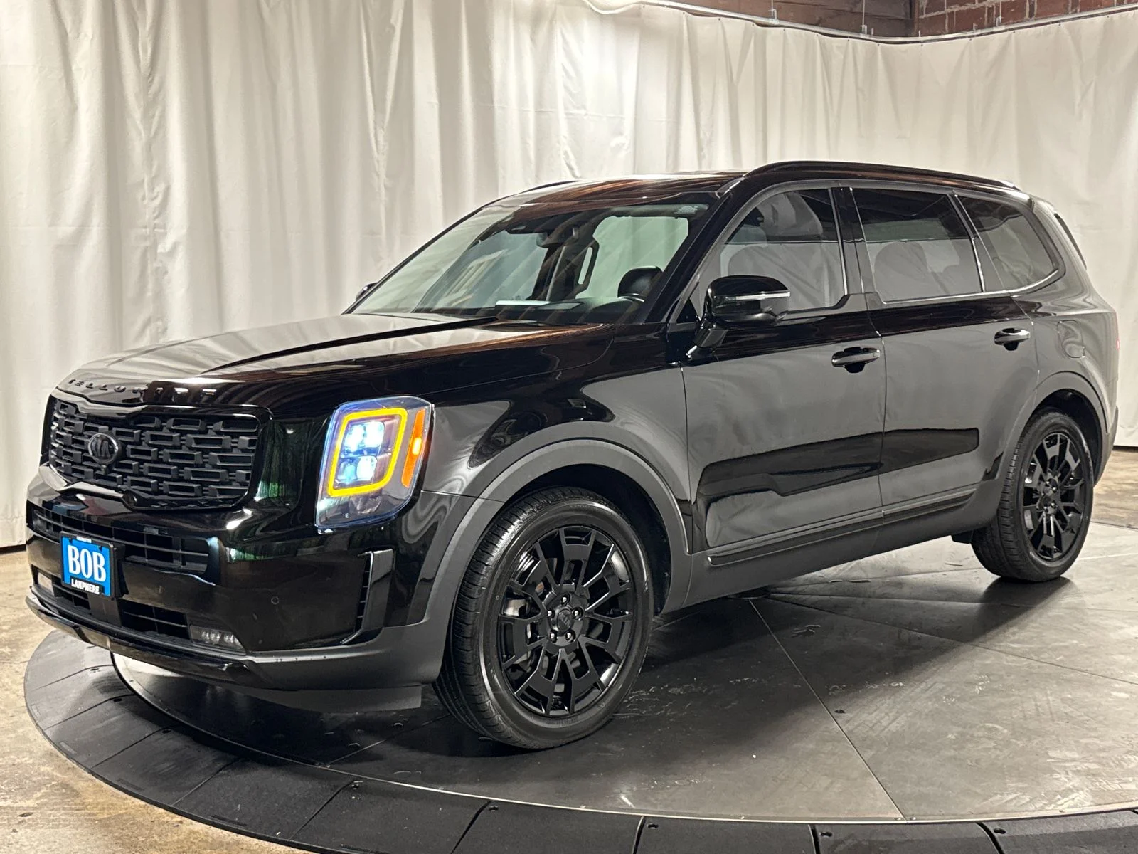 Used 2021 Ebony Black Kia SX image 1