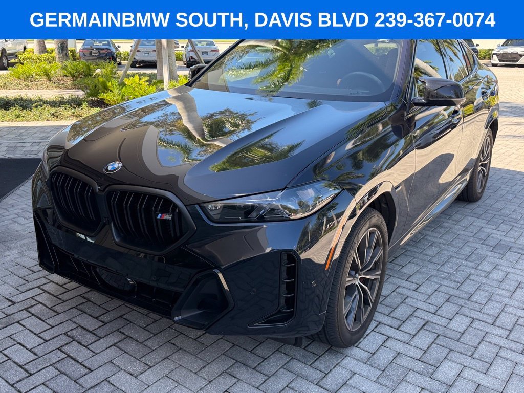 Certified Used 2026 Carbon Black Metallic BMW M60i image 2