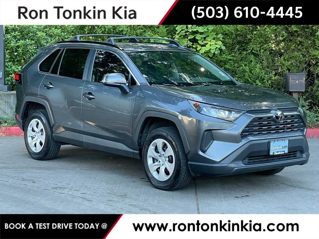 Used 2020 Magnetic Gray Metallic Toyota LE image 1