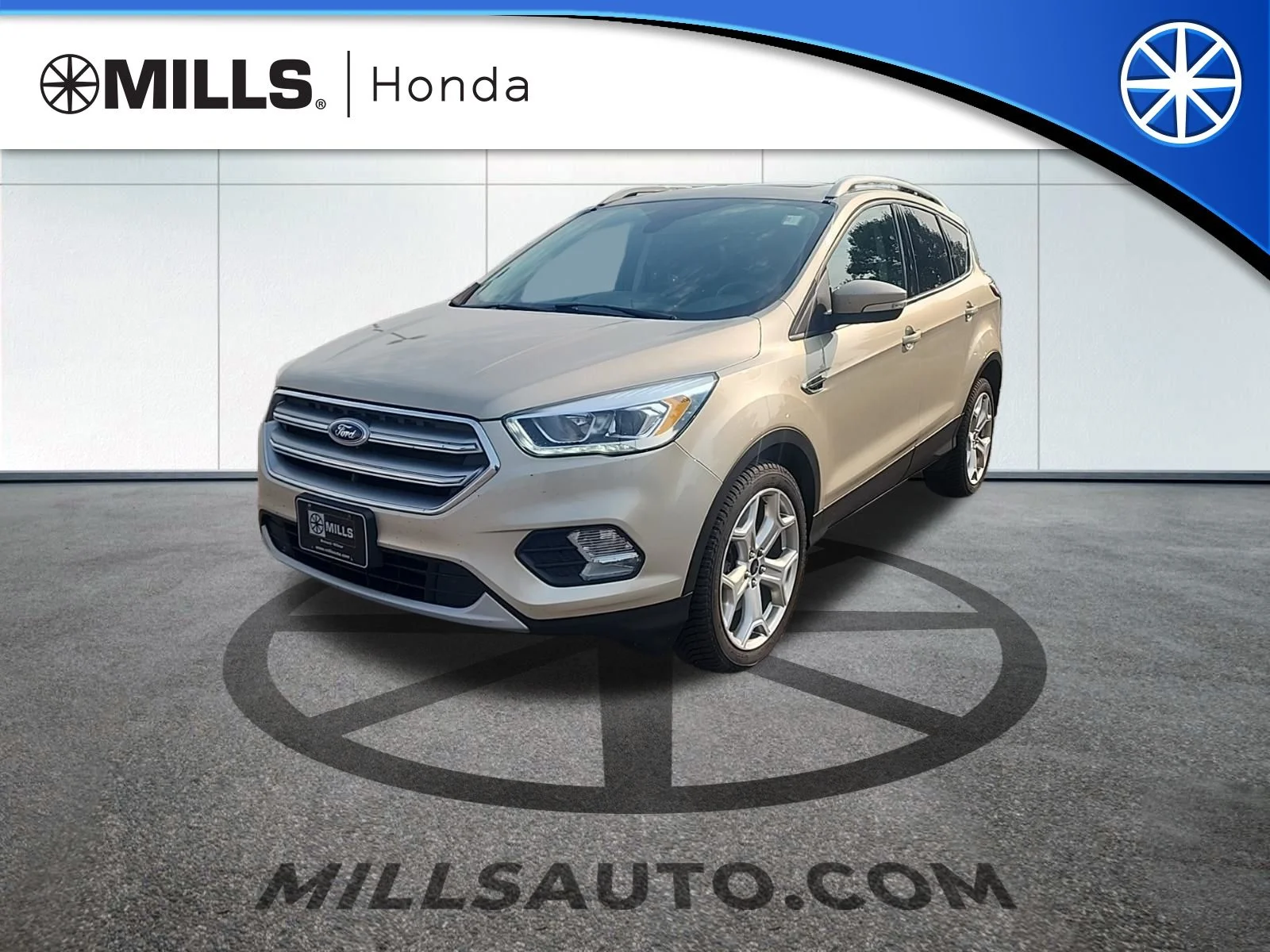 Used 2017 White Gold Metallic Ford Titanium image 1