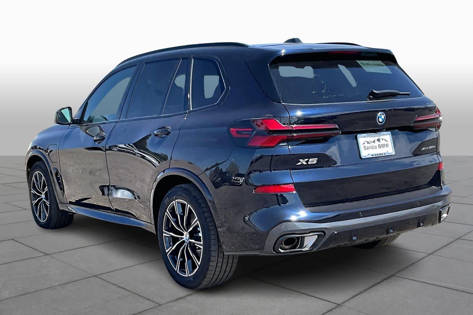 New 2026 Carbon Black Metallic BMW xDrive50e image 12