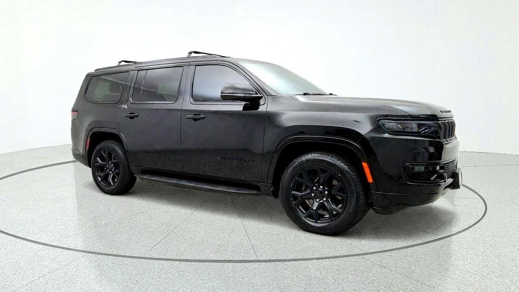 Used 2023 Diamond Black Crystal Pearlcoat Jeep Series II Carbide 4x4 w/ Tri-Pane Roof & Captain