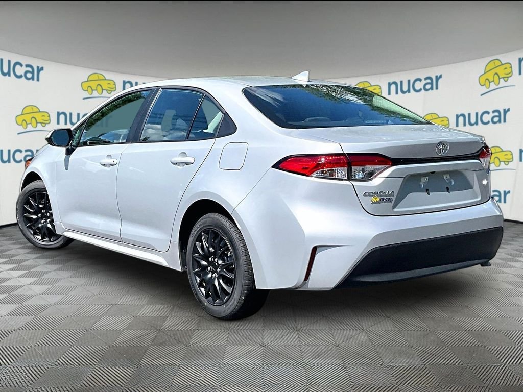 Used 2026 Classic Silver Metallic Toyota LE image 4