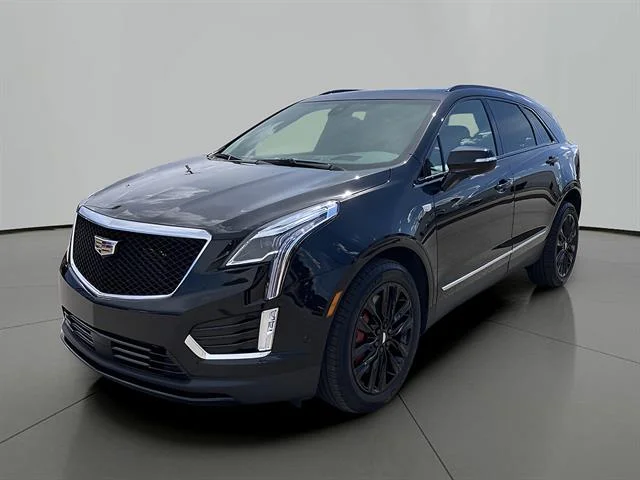 Certified Used 2023 Stellar Black Metallic Cadillac Sport image 1