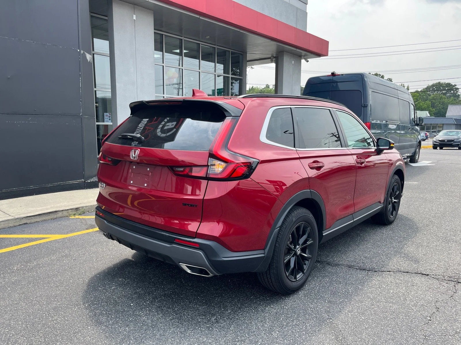 Used 2023 Radiant Red Metallic Honda Sport AWD image 6