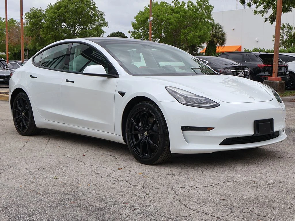 Used 2021 Tesla Model 3 Base with VIN 5YJ3E1EA0MF838428 for sale in Miami, FL
