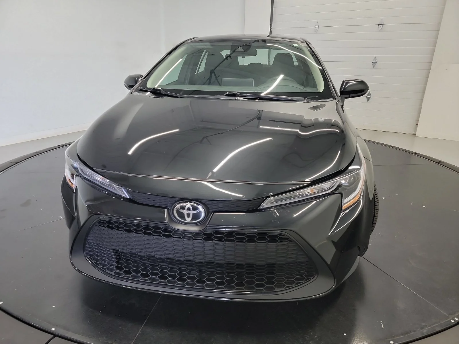 Used 2021 Black Sand Pearl Toyota LE image 2