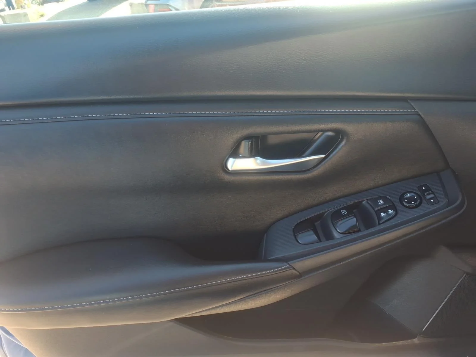 Used 2025 Electric Blue Metallic Nissan SV image 24
