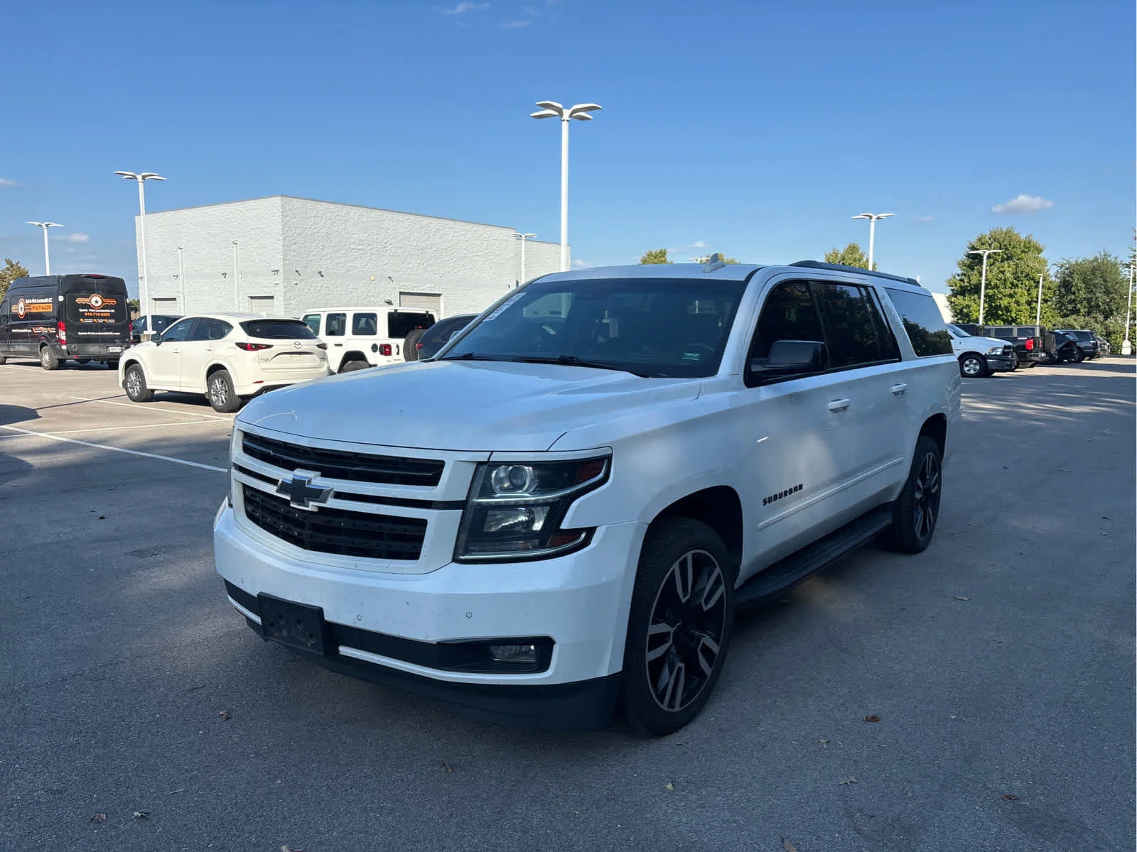 Used 2018 Chevrolet Suburban Premier with VIN 1GNSKJKC8JR348018 for sale in Kansas City