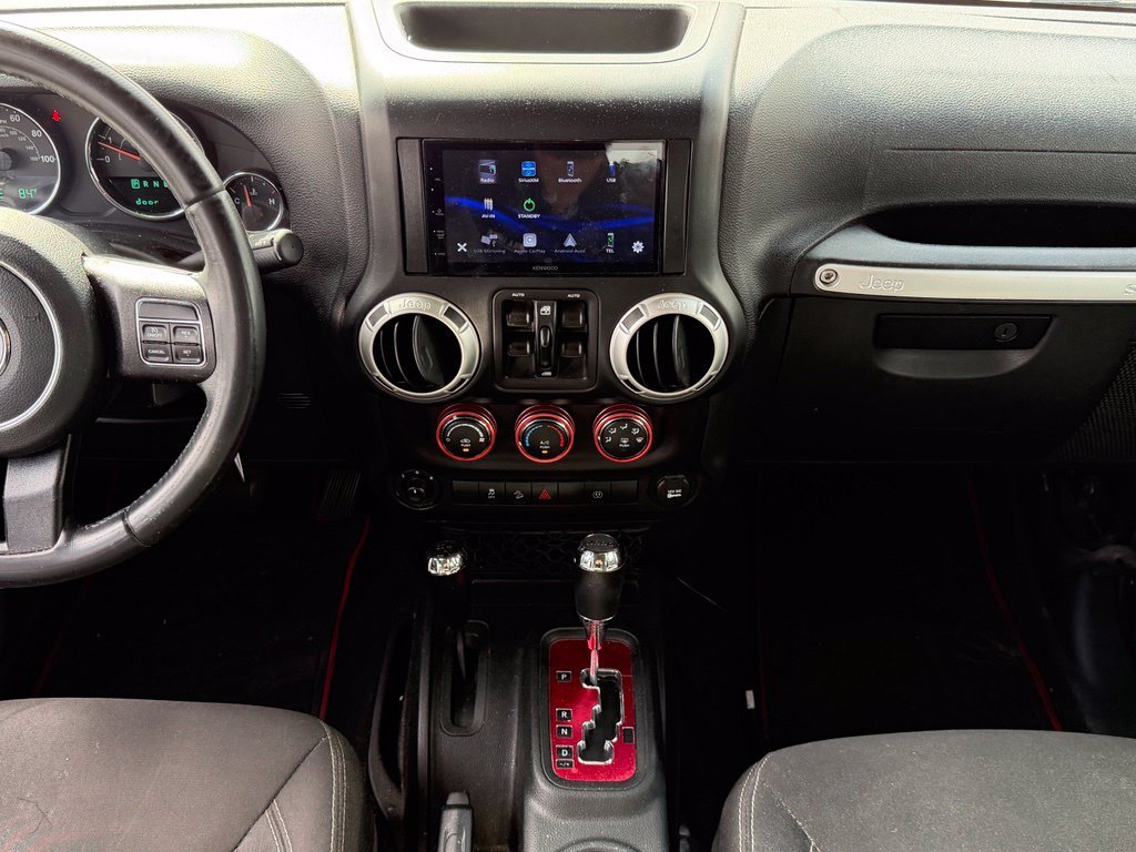 Used 2018 Black Jeep Unlimited Sahara image 10
