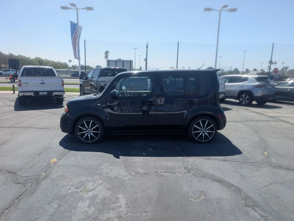 Used 2011 Sapphire Black Pearl Nissan 1.8 S image 2