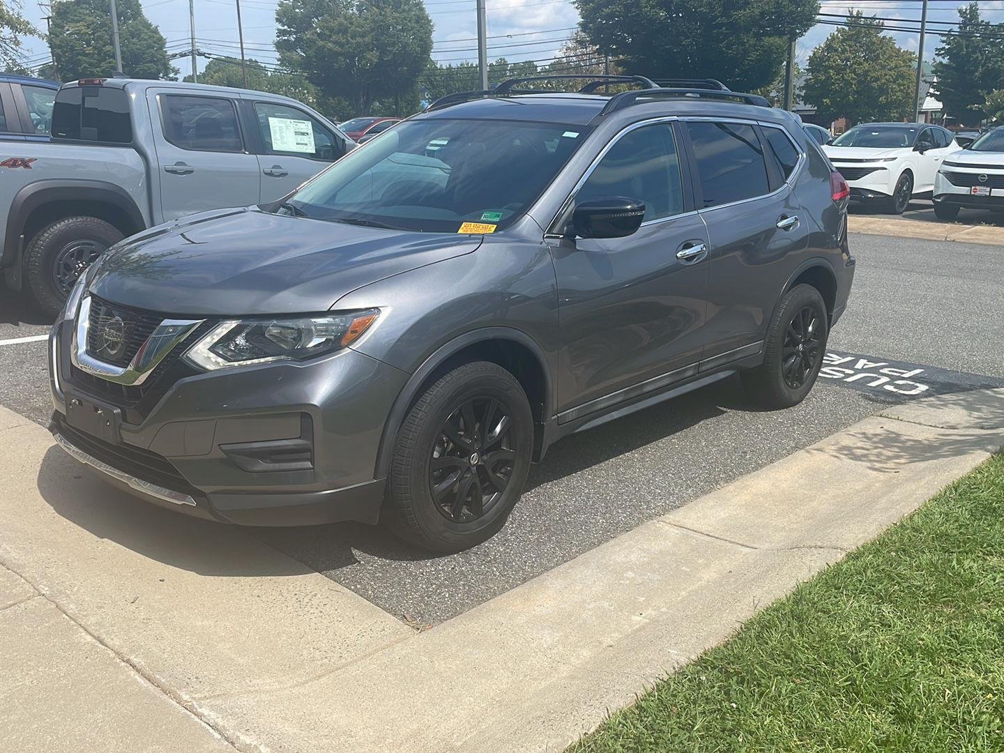 Used 2017 Gun Metallic Nissan SV image 1