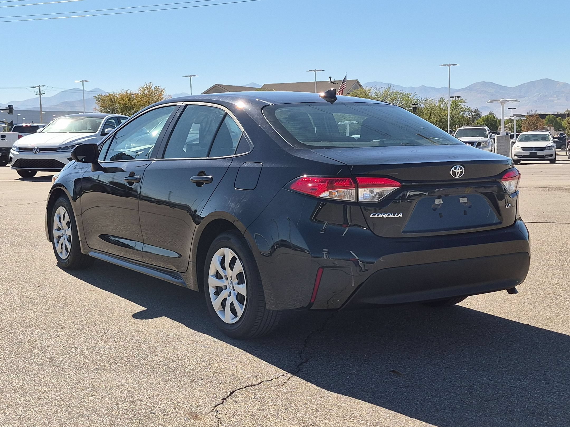 Used 2026 Midnight Black Metallic Toyota LE image 5