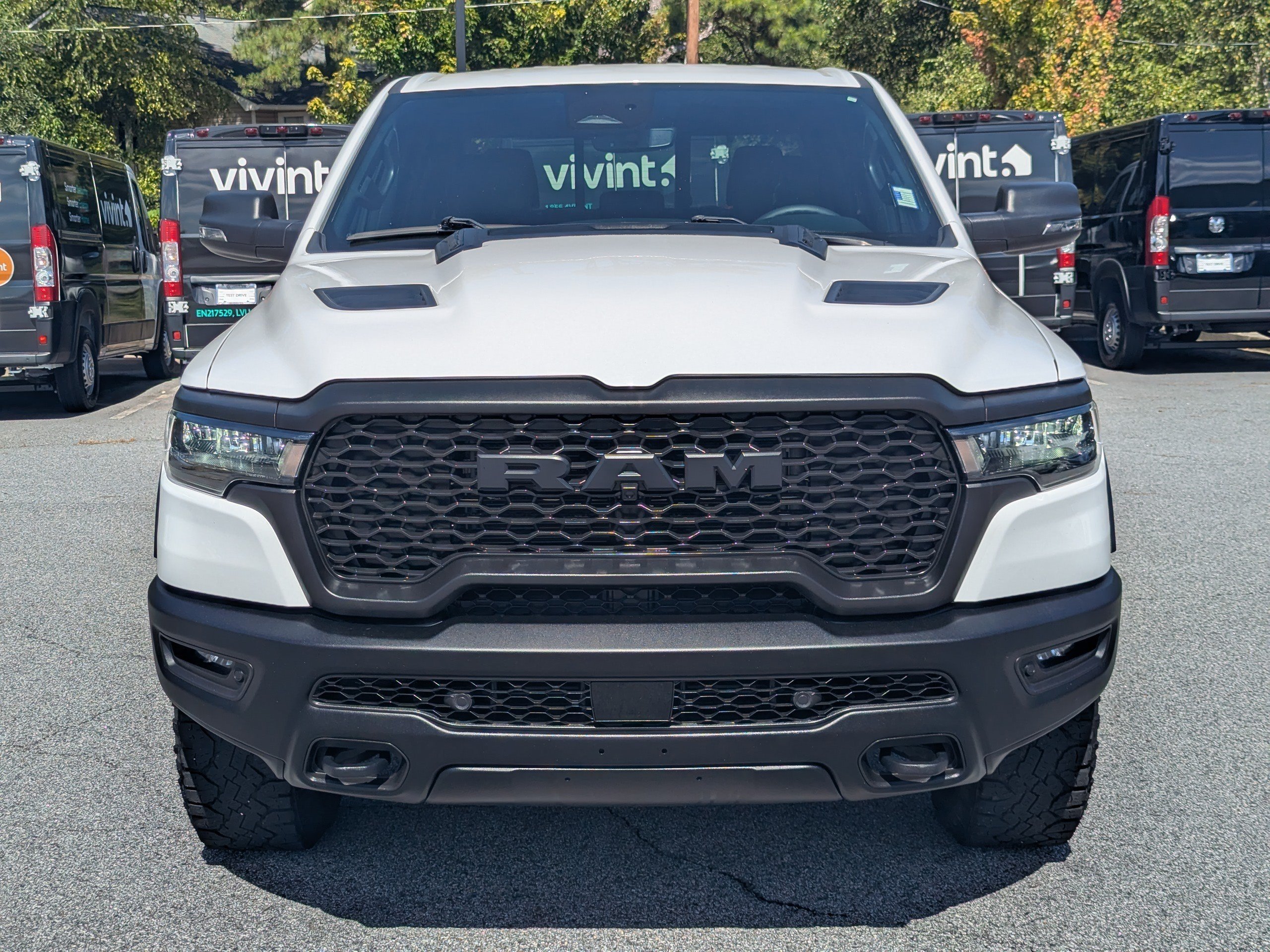 Used 2025 Bright White Clearcoat Ram Rebel image 2