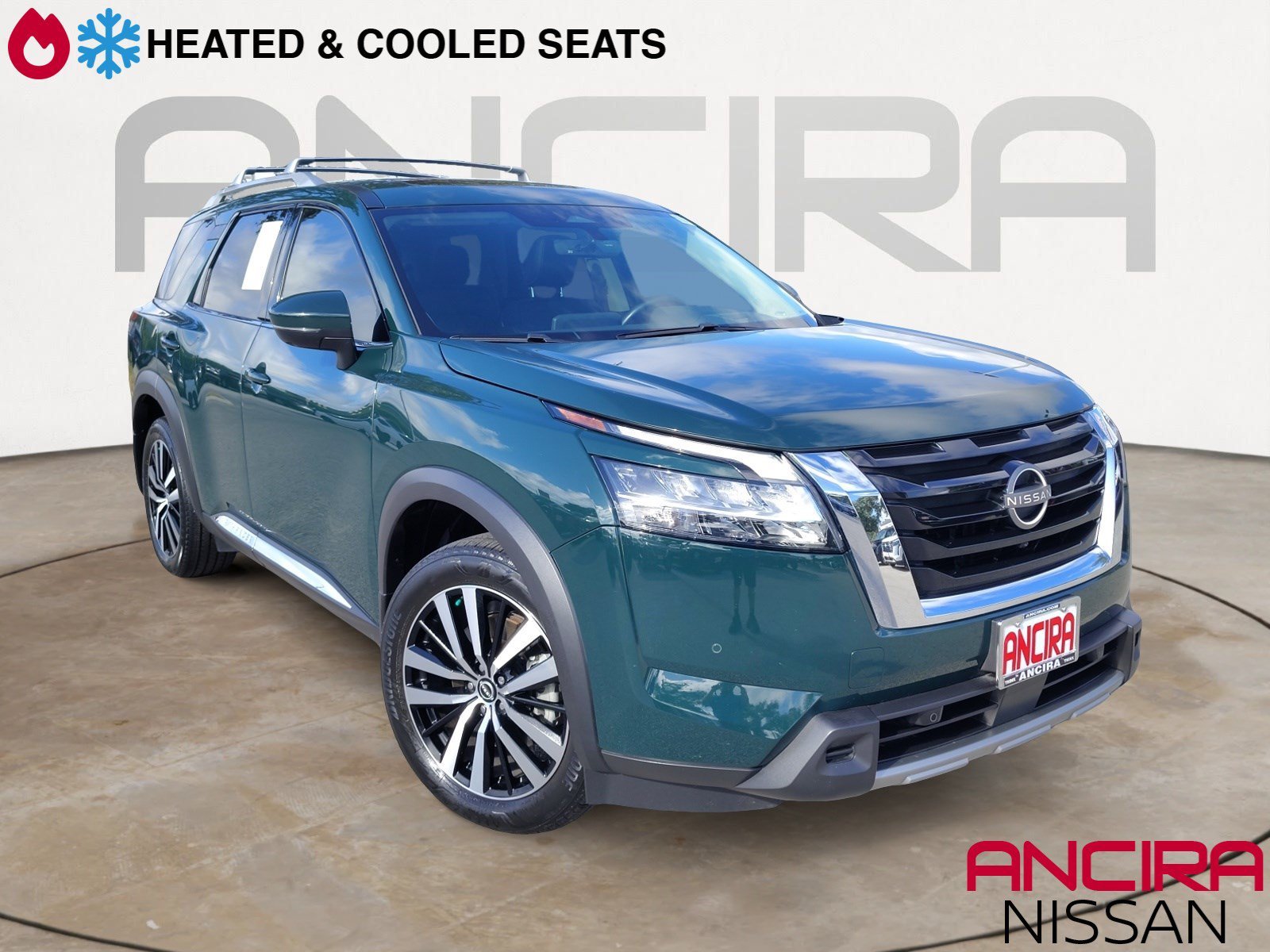 Used 2024 Obsidian Green Pearl Nissan Platinum image 1