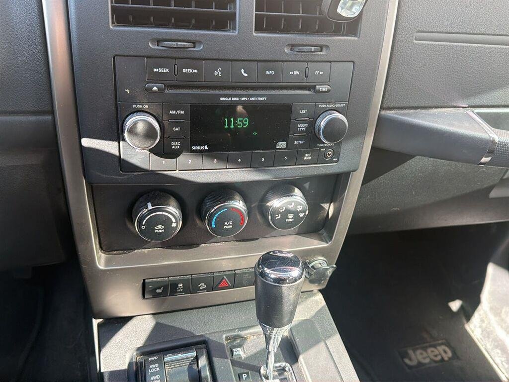 Used 2012 Brilliant Black Crystal Pearl Jeep Sport Latitude image 9