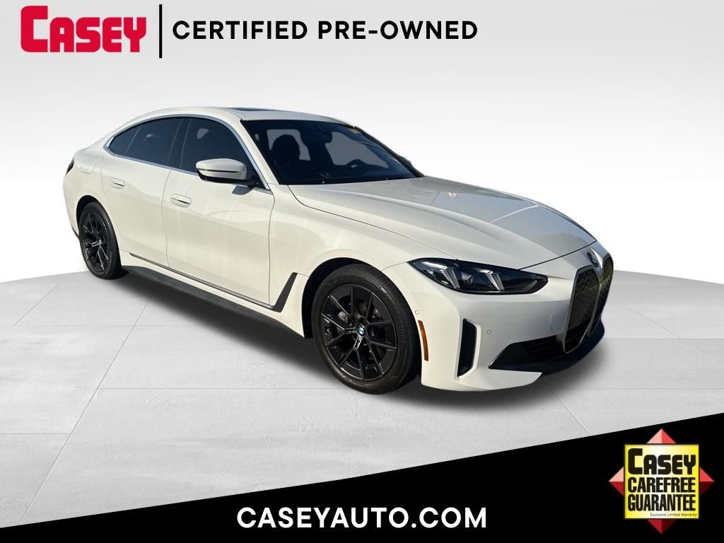 Certified Used 2025 Alpine White BMW xDrive40 image 1