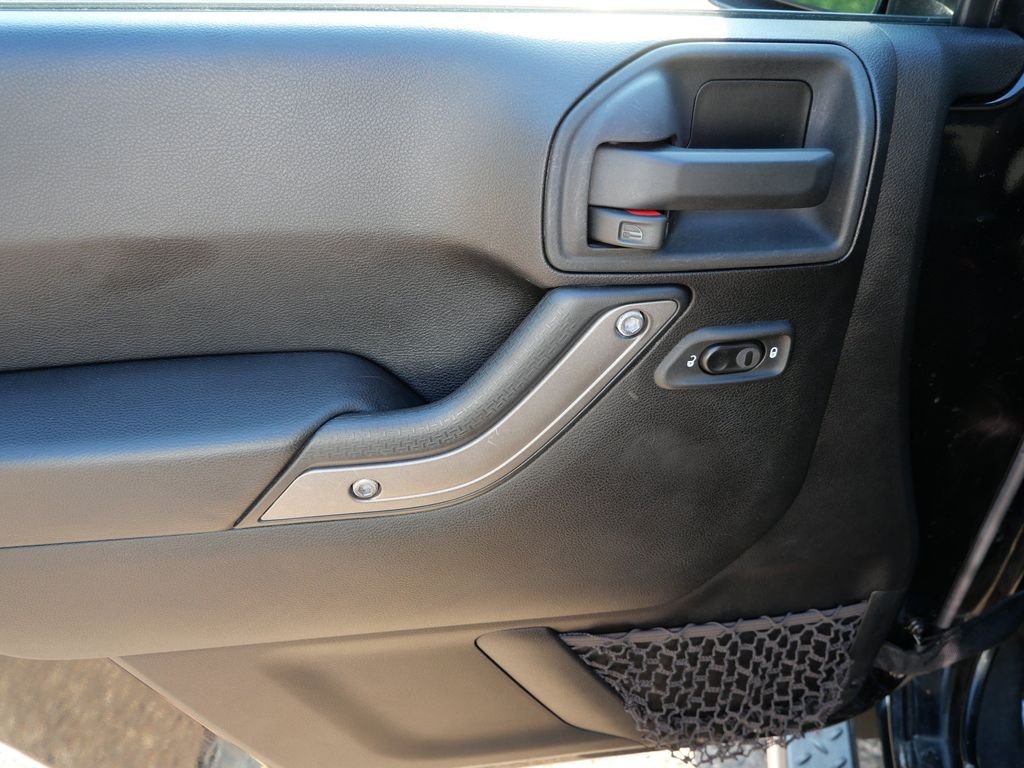 Used 2013 Black Jeep Unlimited Sport image 16