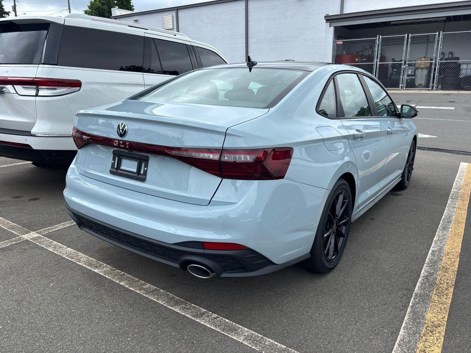 New 2026 Monument Gray w/Deep Black Roof Volkswagen Autobahn image 6