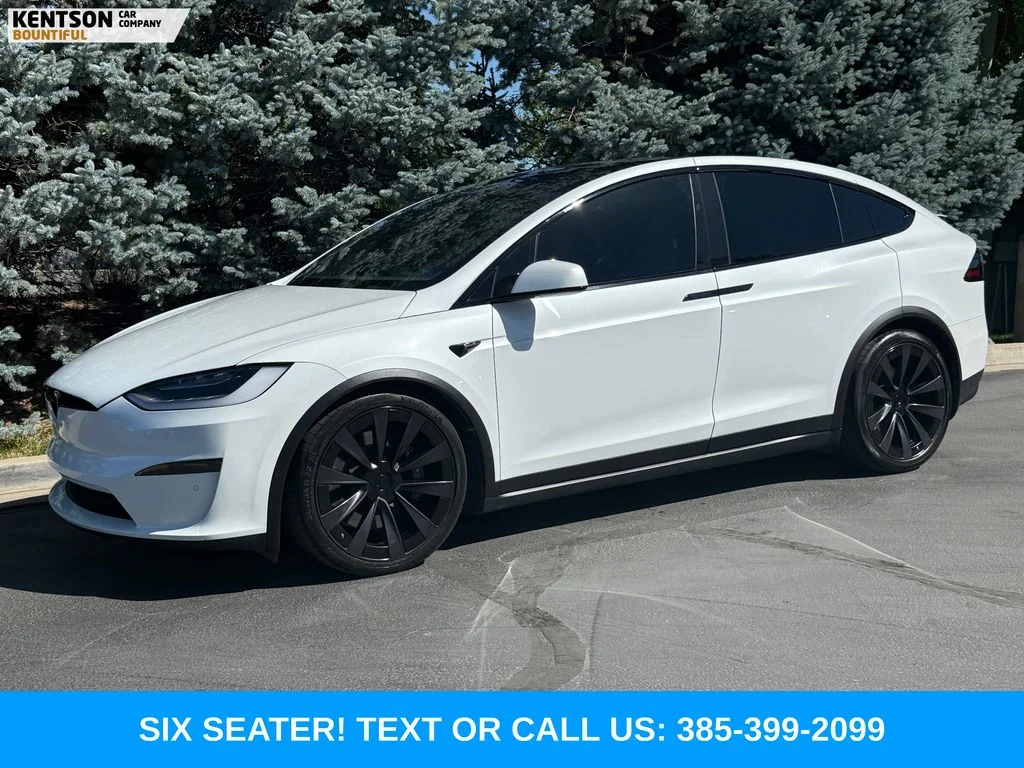 Used 2022 White Tesla Plaid image 1
