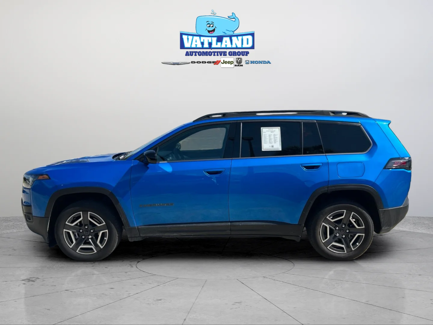 Used 2026 Blue Pearl Jeep Laredo image 2
