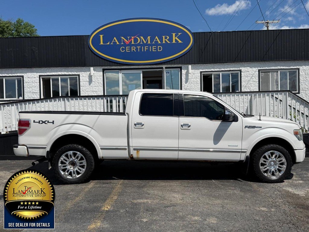Used 2013 White Platinum Metallic Tri-Coat Ford 4WD SuperCrew 145" Platinum image 4