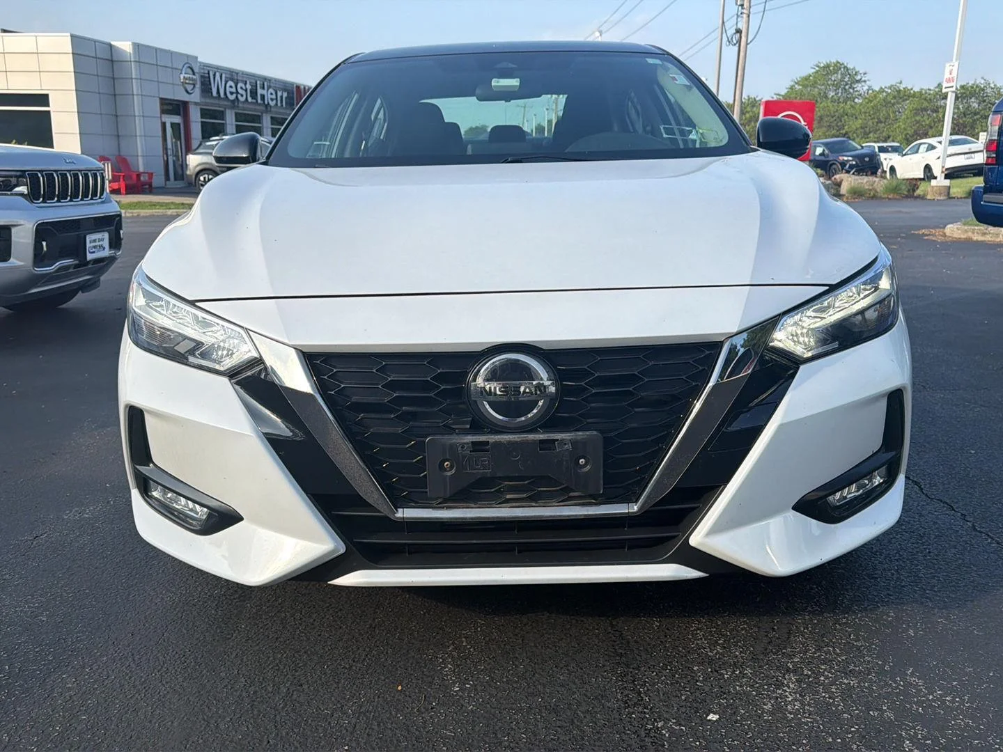 Used 2021 Aspen White/Super Black Nissan SR image 2