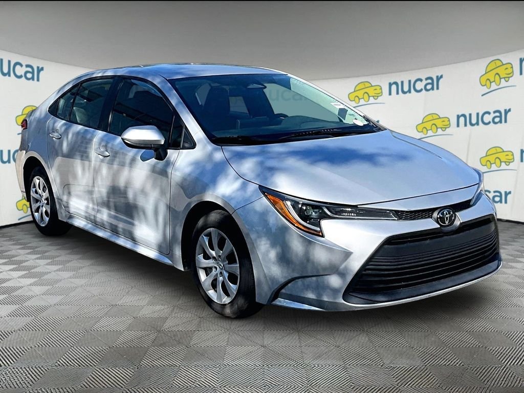 Used 2024 Silver Toyota LE image 1