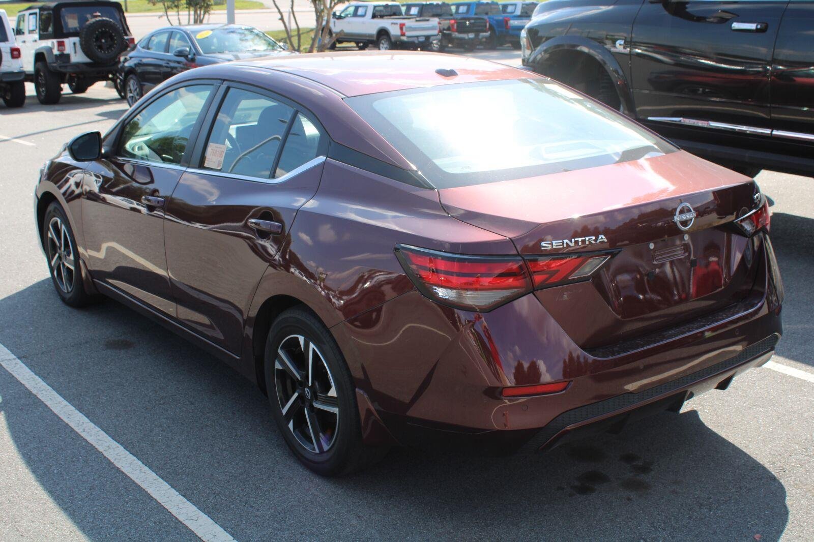 Used 2024 Rosewood Metallic Nissan SV image 8