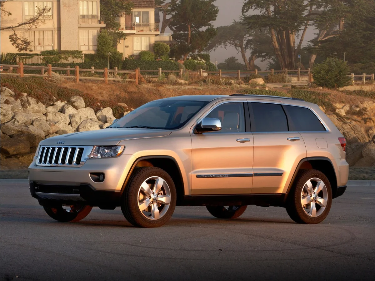 Used 2011 Black Jeep Limited image 1